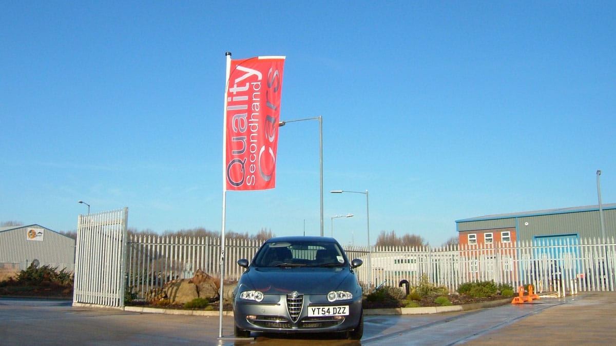 Forecourt Flagpole with blue sky